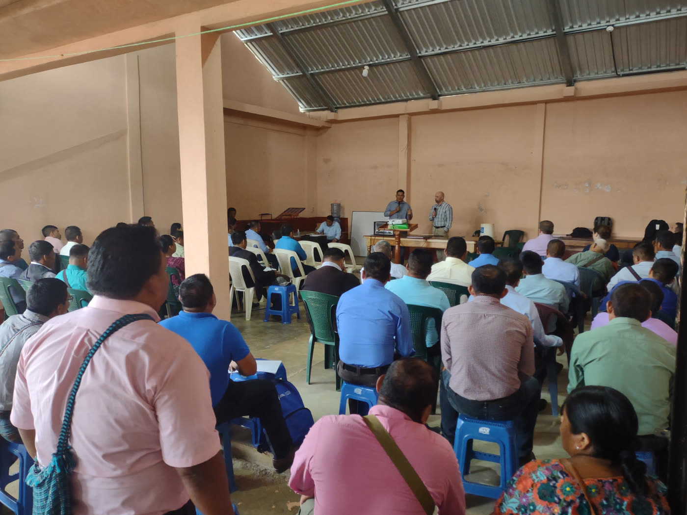 Pastors and church leaders seated at a training session in a church hall
