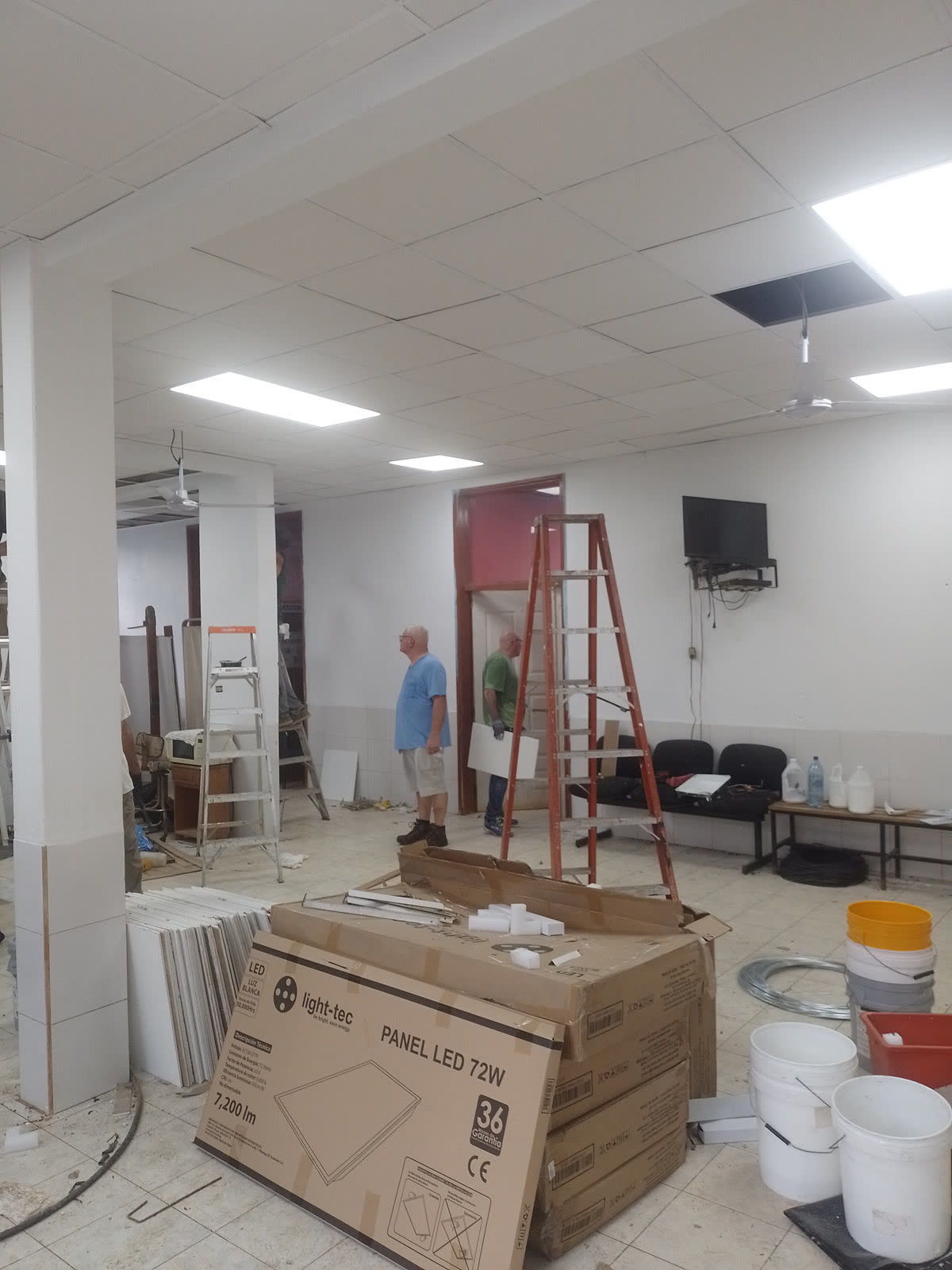 A renovated clinic hallway with boxes of new equipment