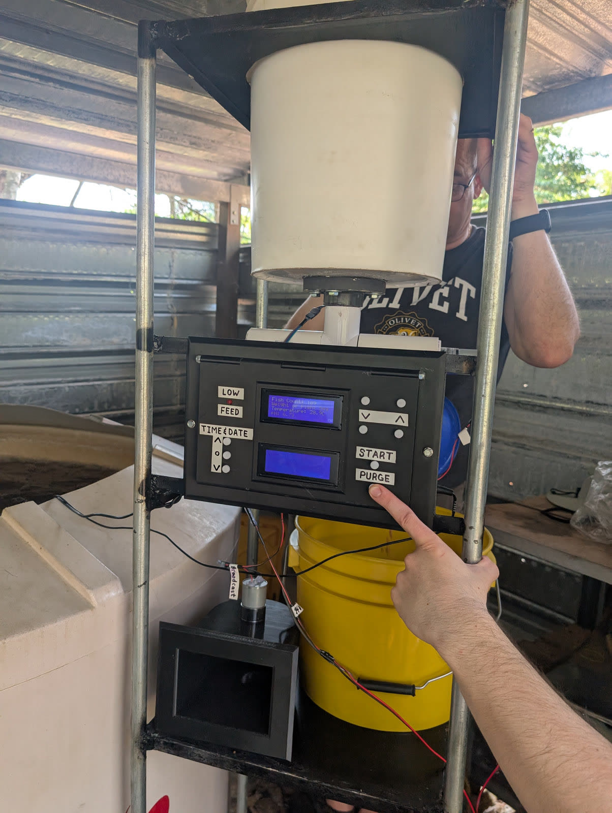 Prototype automatic fish feeder with a digital control panel